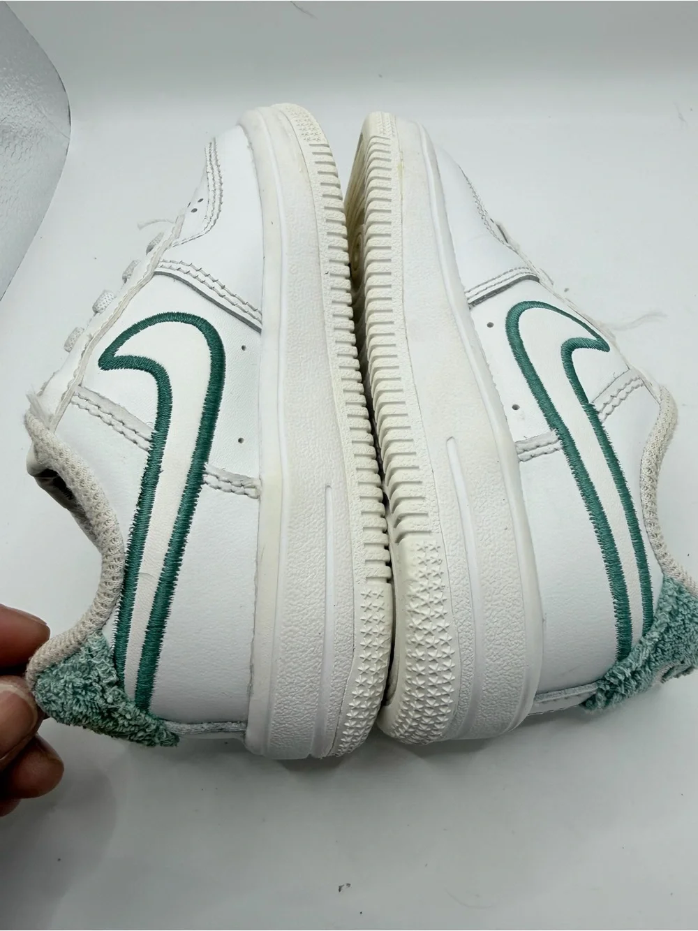 Nike White Kids Sneakers with Dark Green Swoosh